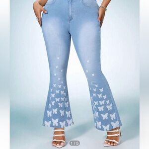 STRETCHY LIGHT WASH FLARE JEANS BUTTERFLY PRINT ON BOTTOM LEG SIZE 4X
